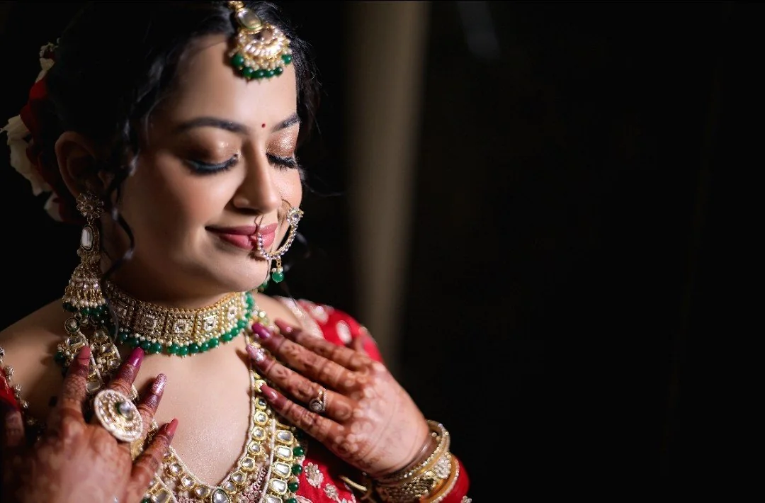 Close-up bridal jewellery and mehendi detail